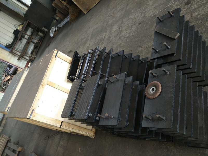 wear liner with welded bolts